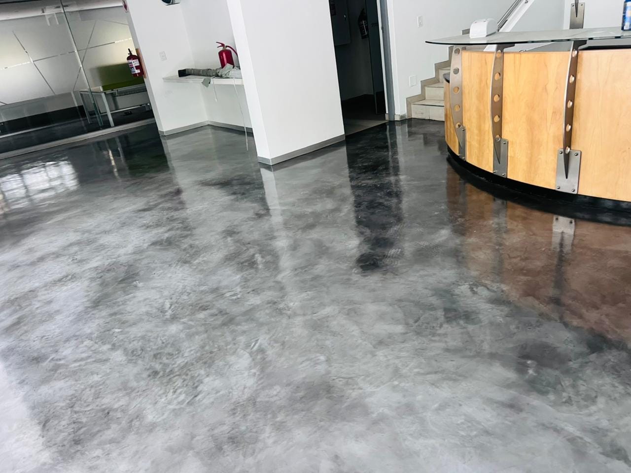 Polished decorative concrete flooring completed by Phuda Construction